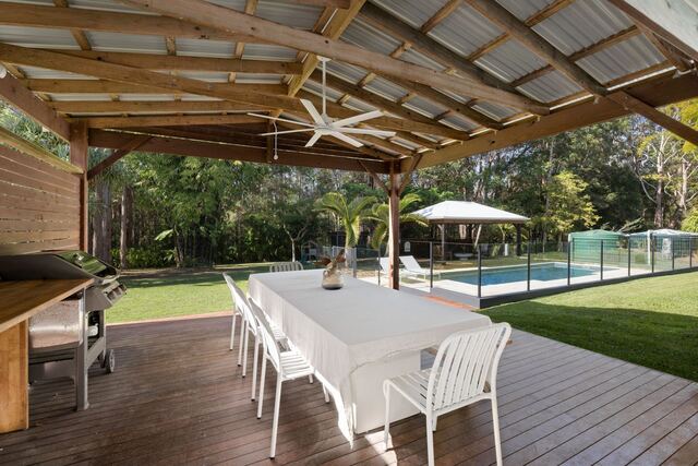 Alfresco dining looking over the pool