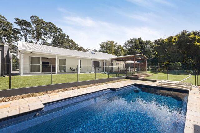 The pool with the house beyond